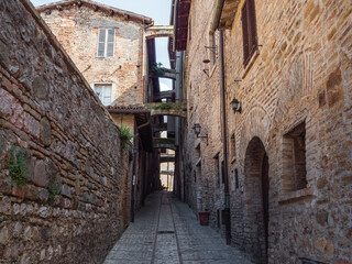 A typical street full of arches in Montefalco's old town, Montefalco, Umbria, Italy