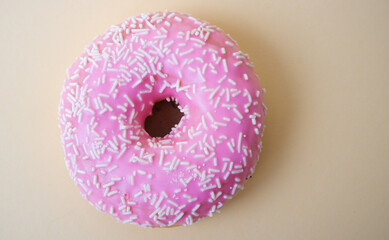 Food. Dessert. Dessert colorful snack. Delicious donut with sprinkles. Bakery cake. Sweet food...