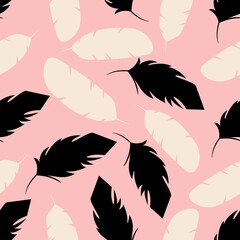 feathers seamless pattern on pink background