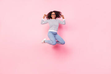 Full length portrait of carefree energetic person direct thumbs on self isolated on pink color background