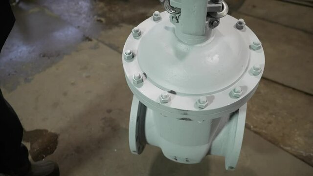 Manufacturing of steel gate valves in an industrial plant. Industrial manufacturer valve. check valve, gate valve, butterfly valve and strainer. Industrial big dimentions gate valves.