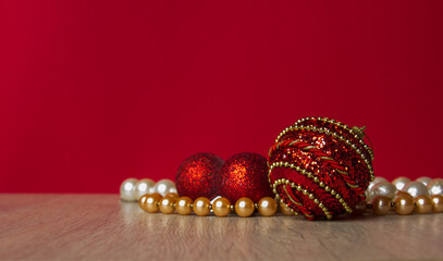 beautiful red balls and beads. Festive decorations. christmas background