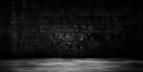 The texture of the brick is black. Background of empty brick basement wall.