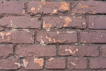 The weathered texture of old dirty red brick wall background. Building. Empty space