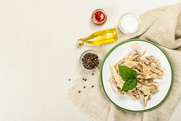 Boiled chicken meat with greens and spices. Low fat animal protein, healthy food lifestyle