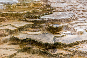 Scenic lifeless calcium terraces at Mammoth Hot Springs, Yellowstone National Park