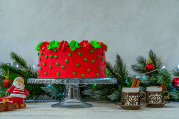 Christmas cake decorated with Christmas trees. Christmas garland. Decoration for the holiday. Beautifully served table for the celebration. Copy space.