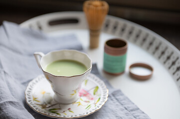 Closeup of cup of matcha. Green healthy japanese tee for detox