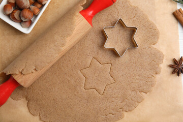 Homemade Christmas cookies. Flat lay composition with dough on table