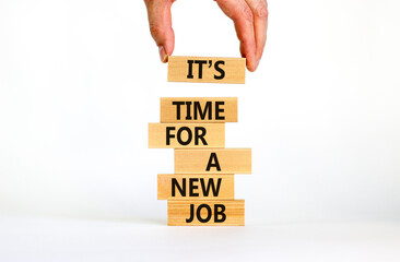 It is time for a new job symbol. Wooden blocks with words It is time for a new job. Beautiful white background, copy space. Businessman hand. Business, time for a new job concept.