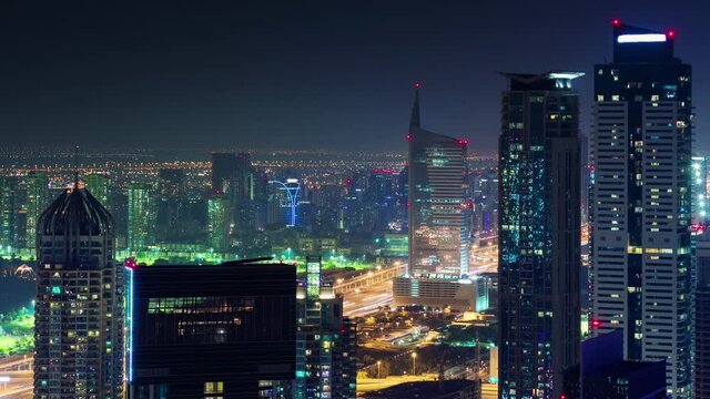 night dubai marina main traffic road light roof top panorama 4k time lapse uae