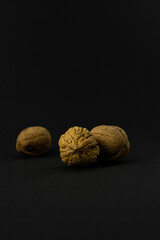 Walnuts on a black background