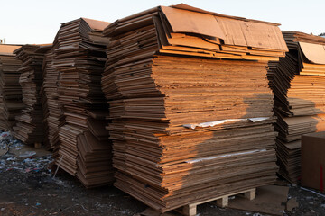 Photo of a large amount of cardboard in production.
