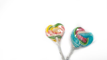 Two aesthetic candies on a white background