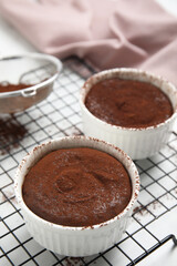 Delicious fresh chocolate fondant on white table, closeup