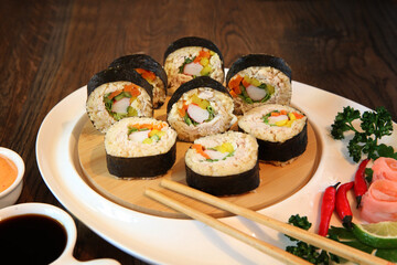 hot roll set sashimi japanese food on wooden background
