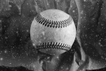 Used baseball in winter snow for sport game of holiday season.