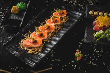 Obraz na płótnie Canvas Perfect Sushi Japanese Asian Seafood Food Dish Menu Gourmet Restaurant Chef on Dark Background