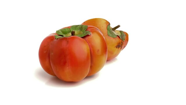 sliced persimmon isolated on white background