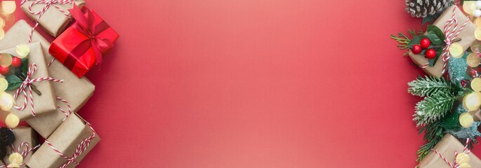 Craft gift boxes Christmas banner on red background with copy space