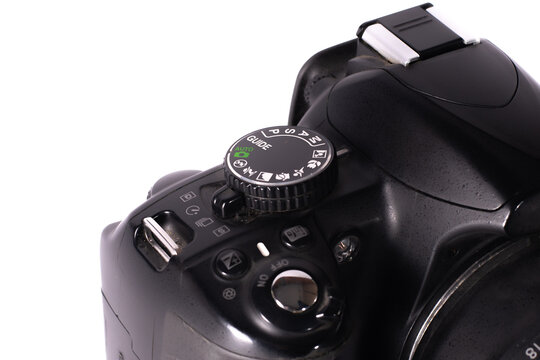 Close-up of professional camera button. Action. Manual mode settings on professional camera. Details of camera