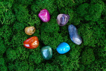 Healing crystals on brown background