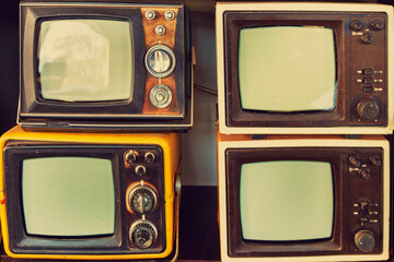 Many retro television. vintage old TV is colorful multi-row. Seeing the past. Pattern wall of  old...