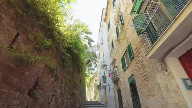 A narrow street in an Italian town Sorrento. Amalfi, Italy, architecture, gimbal move, camera move, path / 4K Video Footage