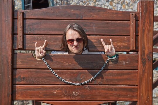 Man caught in pillory accused of crimes