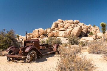 Old antique car wrecks from the old gold rush time in Joshua Tree National Park