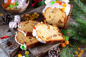 Christmas cake with Christmas decoration on wooden background