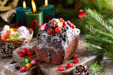 Traditional Christmas cake on wooden table