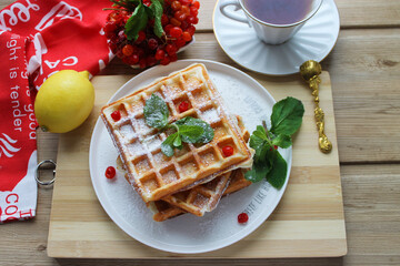 waffles for breakfast on a plate on the table