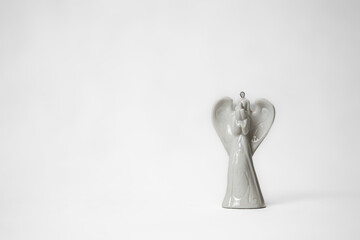 Christmas angel on white background. Little angel firuge isolated at white background