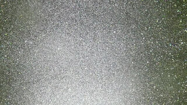 Charcoal grey sparkling glitter background