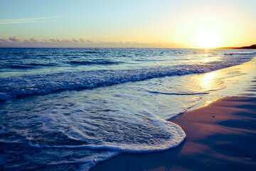 Sunset at the coast of Los Angeles - beautiful view of the sun as she slowly goes down and vanish in the horizont.