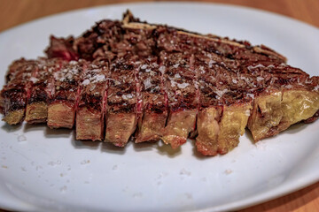 Chuleton, traditional Spanish rib eye steak in a restaurant in Pamplona, Spain