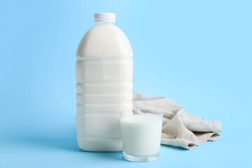 Gallon container of milk on blue background