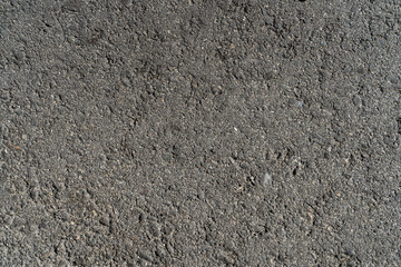 Sidewalk and street concrete asphalt texture with stains and wear