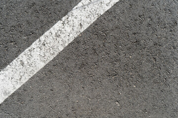 Obraz premium Sidewalk and street concrete asphalt texture with stains and wear