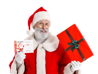 Santa Claus with greeting card and gift on white background
