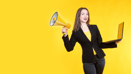 A woman with a laptop and a megaphone. Promotion in social networks. Advertising and notice....