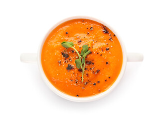 Pot with tasty pumpkin cream soup on white background