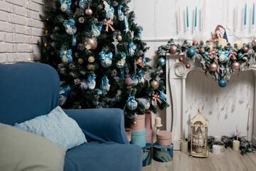 New Year's cozy home interior with a Christmas tree and garlands. the concept of decorating the...