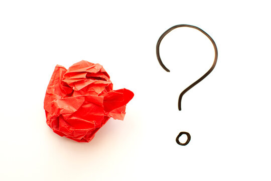 question mark and red crumpled paper . FAQ frequency asked questions, Answer and Brainstorming Concepts