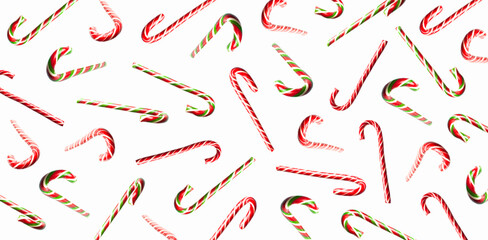 Traditional Christmas candy cane, lollipop on white background pattern flat lay. Creative new year food concept. Festive decor, sweetness, caramel candy. Christmas holiday symbol, decoration