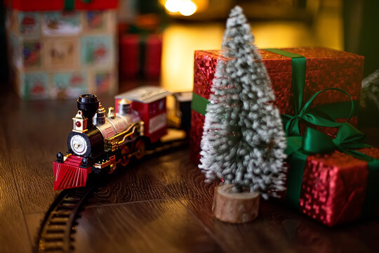christmas locomotive on railway while stands on christmas interior background, Holiday picture 