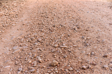 dirt road with many stones, country roads, dirt road, mix of rock fragments, road pavement coating, lateritic material, stones texture, photo panel, background image