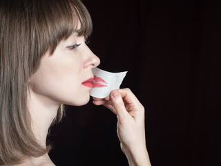 Decision start talking concept. Violation of women rights. Woman taking tape off her mouth...