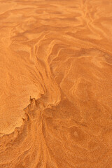 Texture of sand after the rain and wind in the Saudi Arabian desert 